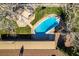 Aerial view of the refreshing pool with diving board and patio area at 4530 W Maulding Ave, Las Vegas, NV 89139
