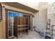 Enclosed patio space with a sliding glass door and privacy screen at 5015 Spencer St # C, Las Vegas, NV 89119