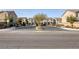 View of homes and street in a well-maintained neighborhood with sidewalks at 5392 Blustery Towns Ave, Las Vegas, NV 89118