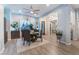 Charming dining room features a ceiling fan, area rug and natural lighting at 5865 Alice Landing Ct, Las Vegas, NV 89149