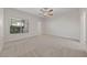 Generously sized bedroom with ceiling fan and neutral carpet at 6704 Indian Chief Dr # 101, Las Vegas, NV 89130