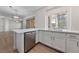 Well-lit modern kitchen with stainless steel appliances and quartz countertops at 6704 Indian Chief Dr # 101, Las Vegas, NV 89130