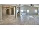 Bright and airy living space with tile floors, an open layout, and neutral color palette at 70 Moonlight Village Ln, Henderson, NV 89012