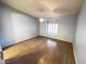 Comfortable bedroom with ceiling fan and shuttered window at 7231 Indian Creek Ln # 204, Las Vegas, NV 89149