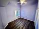 Cozy bedroom with a ceiling fan, shuttered window, and spacious closet at 7231 Indian Creek Ln # 204, Las Vegas, NV 89149