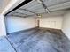 Spacious garage with a modern garage door and ample room for vehicles and storage at 7231 Indian Creek Ln # 204, Las Vegas, NV 89149