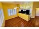 Bright breakfast bar area, tile floors, and natural light from the window at 7231 Indian Creek Ln # 204, Las Vegas, NV 89149