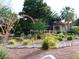Lush garden landscaping with colorful plants and stone accents, creating a serene outdoor space at 7231 Indian Creek Ln # 204, Las Vegas, NV 89149