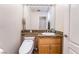 Cozy bathroom featuring granite counters, modern toilet, and stylish decor at 8225 Taos Paseo Ave, Las Vegas, NV 89128