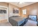 Bright bedroom offering a comfortable bed, neutral tones, and ample space, creating a relaxing retreat at 8225 Taos Paseo Ave, Las Vegas, NV 89128