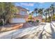 Charming two-story home featuring a well-maintained yard, a tile roof, and a two-car garage at 8225 Taos Paseo Ave, Las Vegas, NV 89128