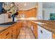 Well-equipped kitchen featuring granite countertops, ample cabinet space, and stainless steel appliances at 8225 Taos Paseo Ave, Las Vegas, NV 89128
