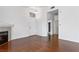 Bright open floor plan is enhanced by hardwood floors and a fireplace at 8805 Jeffreys St # 2002, Las Vegas, NV 89123
