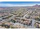 Panoramic aerial view of a sprawling suburban neighborhood with mountains in the distance at 9563 Grapeland Ave, Las Vegas, NV 89148