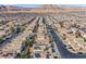 Neighborhood aerial featuring an expansive view of rooftops with mountain backdrop at 9563 Grapeland Ave, Las Vegas, NV 89148