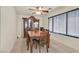 Inviting dining room featuring a decorative china cabinet and a wooden dining table at 9563 Grapeland Ave, Las Vegas, NV 89148