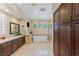 Bright and airy bathroom with and vanities, stand alone tub, and tiled shower at 11473 Glowing Sunset Ln, Las Vegas, NV 89135