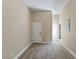 Room featuring carpet and tan colored walls with two doors at 11473 Glowing Sunset Ln, Las Vegas, NV 89135