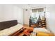 Cozy living room with wood floors, white walls, large window and an open doorway at 1381 E University Ave # 301, Las Vegas, NV 89119