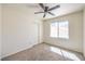 Cozy bedroom with carpet flooring, a window, and closet with sliding doors at 2180 Maple Shade St, Henderson, NV 89002