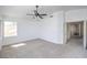 Comfortable bedroom with neutral carpet, a ceiling fan, and ample natural light at 2180 Maple Shade St, Henderson, NV 89002