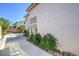 Beautiful single-Gathering home exterior with lush landscaping and a spacious cement patio at 2180 Maple Shade St, Henderson, NV 89002