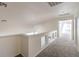 Carpeted hallway with natural lighting at 2180 Maple Shade St, Henderson, NV 89002
