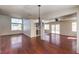Spacious living room featuring hardwood floors and ample natural light at 2180 Maple Shade St, Henderson, NV 89002