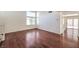 Bright living room featuring tall windows and hardwood floors at 2180 Maple Shade St, Henderson, NV 89002