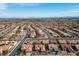Expansive aerial view showcasing rooftops across a vibrant residential community at 2720 Spalding Dr, Las Vegas, NV 89134