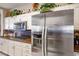 Well-equipped kitchen with stainless steel appliances, custom cabinets, and granite counters at 2720 Spalding Dr, Las Vegas, NV 89134
