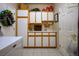 Laundry room with white cabinets and a sink, offering functionality and storage at 2720 Spalding Dr, Las Vegas, NV 89134