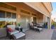 Inviting covered patio with comfortable seating arrangement for outdoor relaxation at 2720 Spalding Dr, Las Vegas, NV 89134