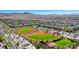 Residential community aerial view featuring baseball field and green spaces at 3049 Echoed Rondel Ln, Henderson, NV 89044