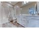 Bathroom featuring dual sinks, vanity with storage, and shower-tub combo at 3049 Echoed Rondel Ln, Henderson, NV 89044