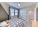 Charming bedroom with neutral walls, and convenient closet storage at 3049 Echoed Rondel Ln, Henderson, NV 89044
