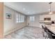 Bright dining area with shuttered windows near a stylish kitchen at 3049 Echoed Rondel Ln, Henderson, NV 89044