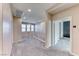 Upstairs hallway featuring neutral colored walls, white railing, and carpeted floors at 3049 Echoed Rondel Ln, Henderson, NV 89044