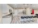 Modern kitchen with a large island, granite countertops, and stainless steel appliances at 3049 Echoed Rondel Ln, Henderson, NV 89044