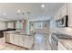 Modern kitchen with granite countertops, stainless steel appliances, and stylish fixtures at 3049 Echoed Rondel Ln, Henderson, NV 89044