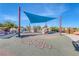 Bright and colorful community playground with a hopscotch game at 3049 Echoed Rondel Ln, Henderson, NV 89044