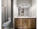 Bathroom features wood cabinets, marble countertops, dual sinks and a large mirror with lighting at 344 Tuscany Cir, Mesquite, NV 89027