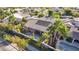 Inviting home featuring a tiled roof, solar panels, lush landscaping and a sparkling pool at 3615 Hardwick Hall Way, Las Vegas, NV 89135