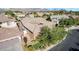 Desert home with a stylish tile roof, low maintenance landscaping, and mountain views at 3615 Hardwick Hall Way, Las Vegas, NV 89135