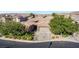 A beautiful home featuring mature landscaping and a large driveway, nestled in a quiet neighborhood at 3615 Hardwick Hall Way, Las Vegas, NV 89135