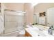 Bathroom featuring a shower-tub combination, a single sink vanity, and neutral color tones at 3615 Hardwick Hall Way, Las Vegas, NV 89135