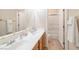 Bathroom featuring a double sink vanity with a large mirror and a shower-tub combination at 3615 Hardwick Hall Way, Las Vegas, NV 89135