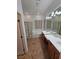Spacious bathroom offering a glass-enclosed shower, soaking tub, double sinks and large mirror at 3615 Hardwick Hall Way, Las Vegas, NV 89135