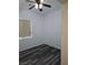 Bedroom featuring modern wood flooring and a large window at 3615 Hardwick Hall Way, Las Vegas, NV 89135