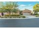 Charming single-story home with a well-manicured front yard and a two-car garage at 3615 Hardwick Hall Way, Las Vegas, NV 89135
